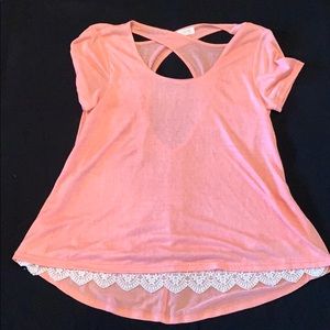 Open back, peach colored with white lace in front